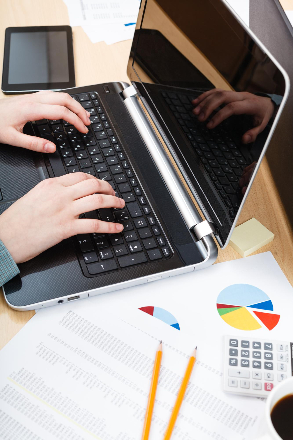 office-worker-working-with-laptop-office-table